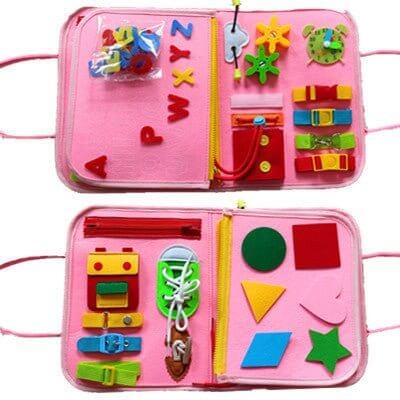 Educational toys for toddlers UAE by Urban Souk with colorful shapes, letters, and lacing activities in a pink activity book
